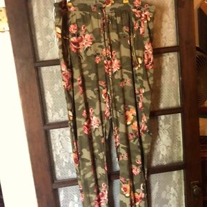 Gren pants with flowers on it